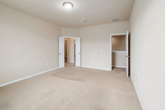 an empty room with windows