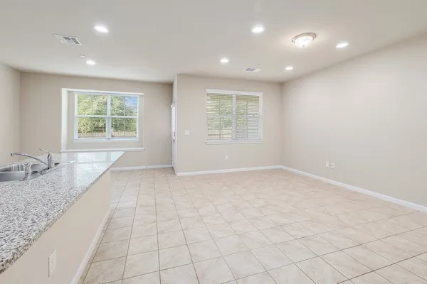 an empty room with windows