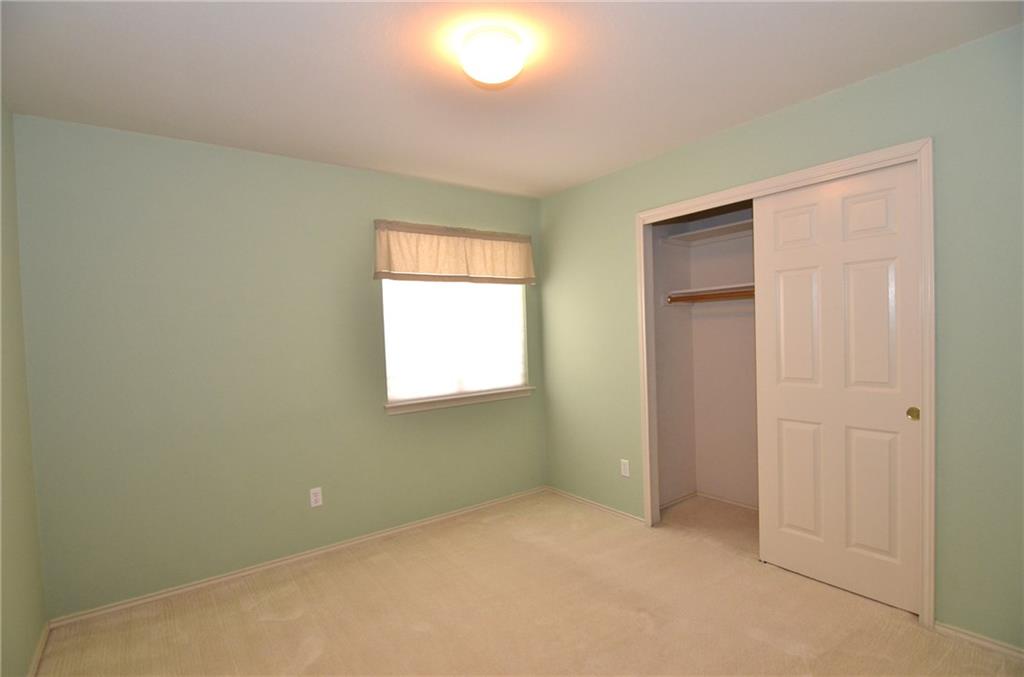 3609 Ruby Red Drive Austin, TX 78728 - Photo 13 of 21 Unfurnished bedroom with carpet and a closet