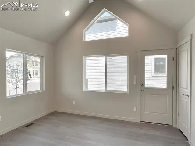 an empty room with windows