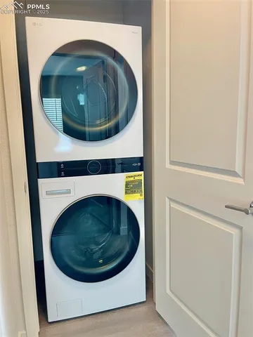 a bathroom with a tub and mirror