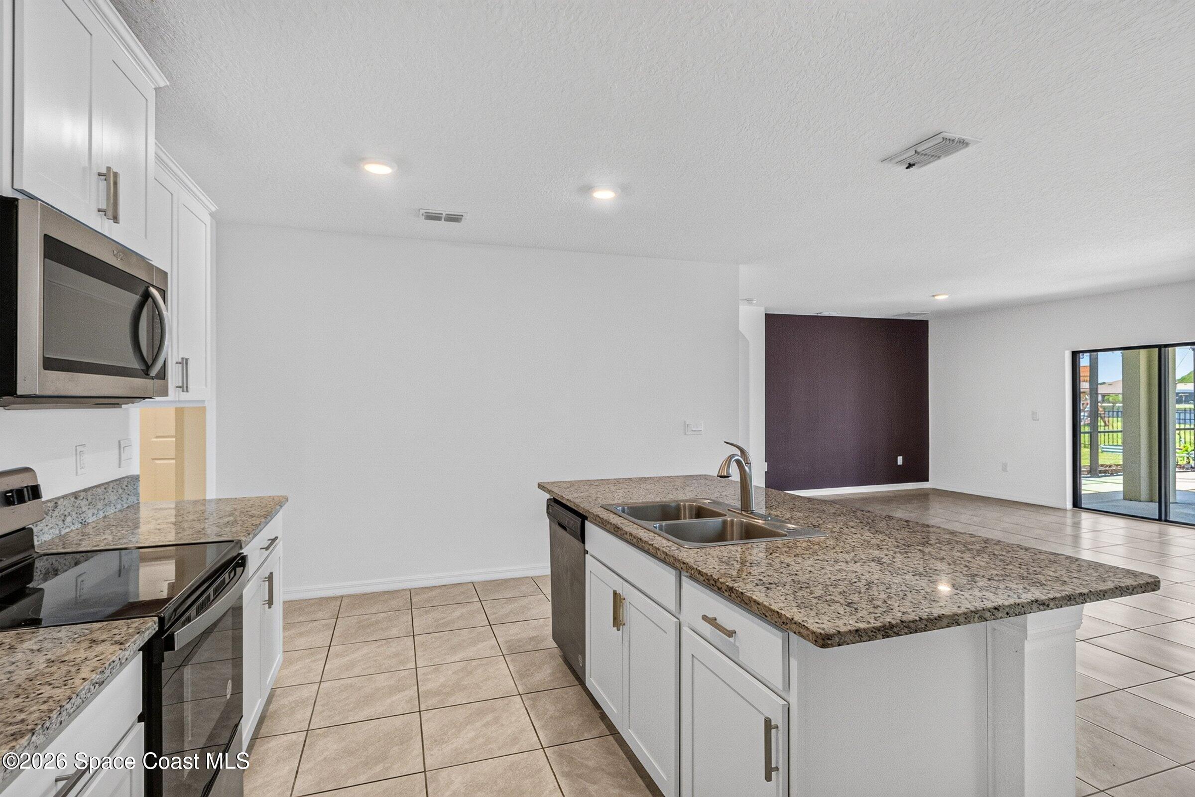 3419 Foggy Mist Road Southeast Palm Bay, FL 32909 - Photo 6 of 39 Kitchen