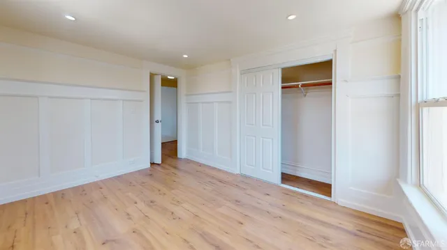 a utility room with sink dryer and washer