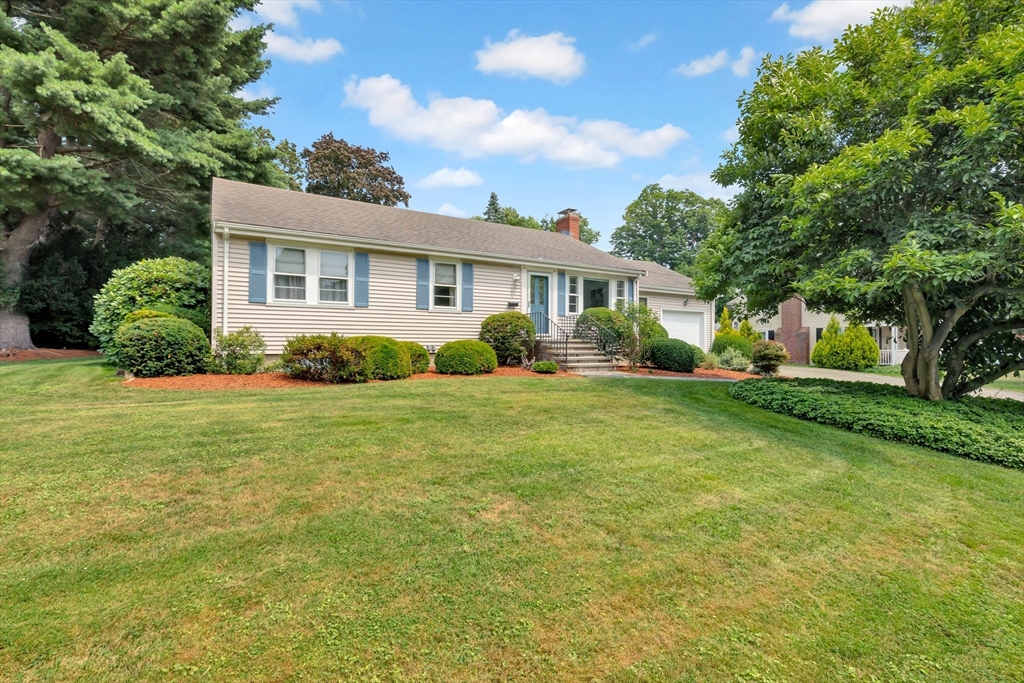 21 Gleason Road Lexington, MA 02420 - Photo 1 of 42 a front view of house with yard and green space