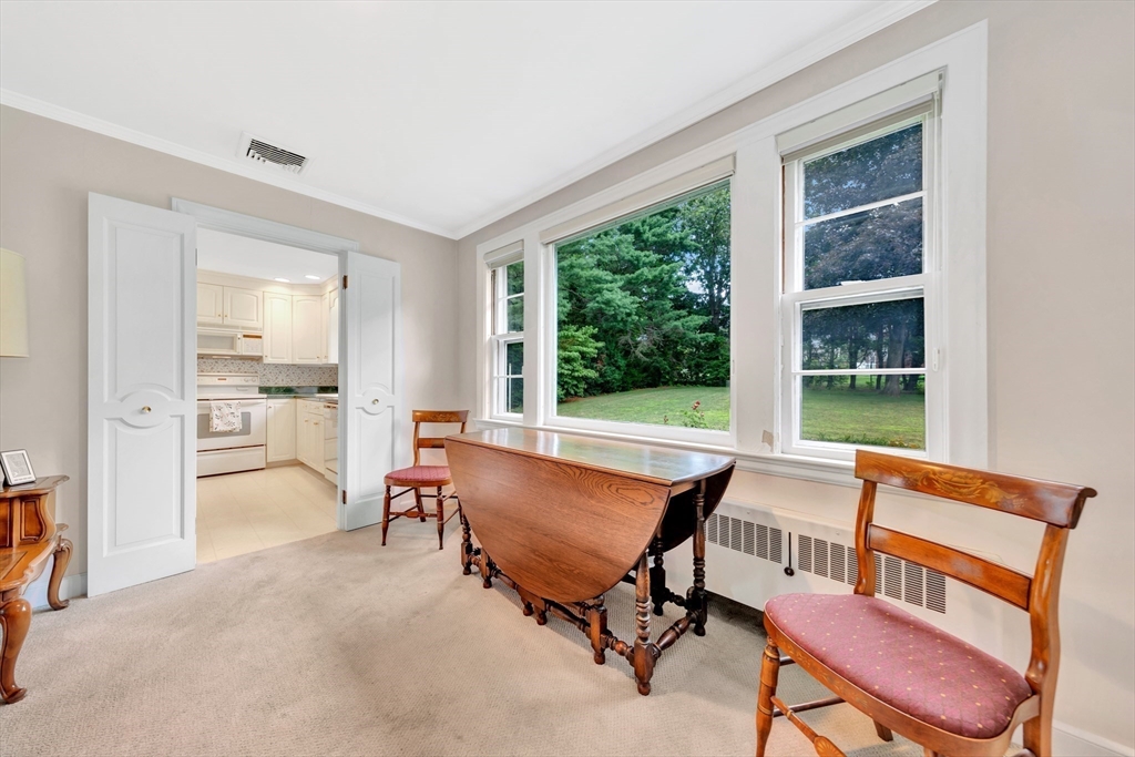 21 Gleason Road Lexington, MA 02420 - Photo 21 of 42 a living room with furniture and a window