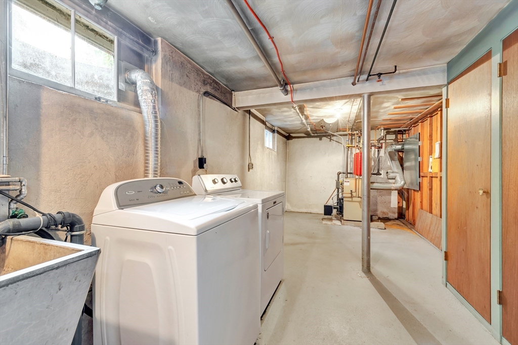 21 Gleason Road Lexington, MA 02420 - Photo 39 of 42 a utility room with dryer and washer