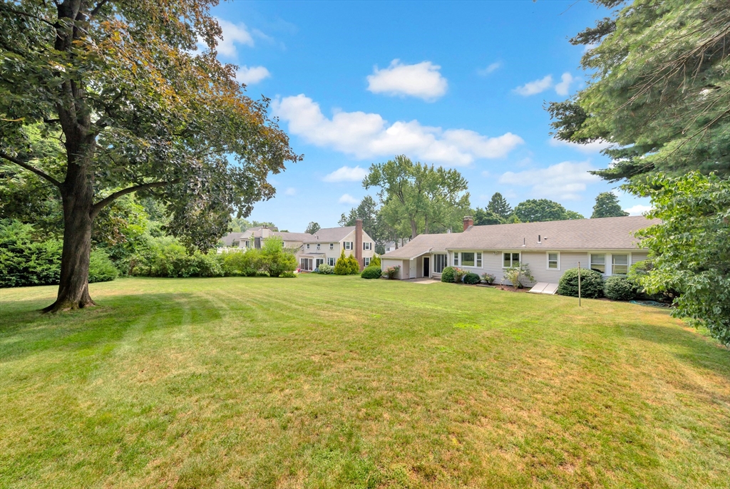 21 Gleason Road Lexington, MA 02420 - Photo 6 of 42 a view of a house with a big yard