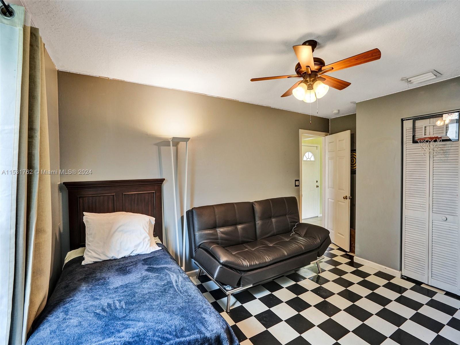 Greenacres Greenacres, FL 33413 - Photo 37 of 61 a living room with furniture and a rug