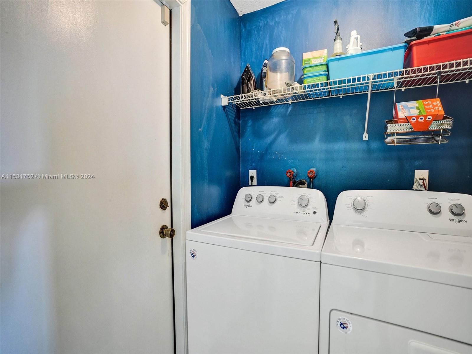 Greenacres Greenacres, FL 33413 - Photo 41 of 61 a utility room with dryer and washer