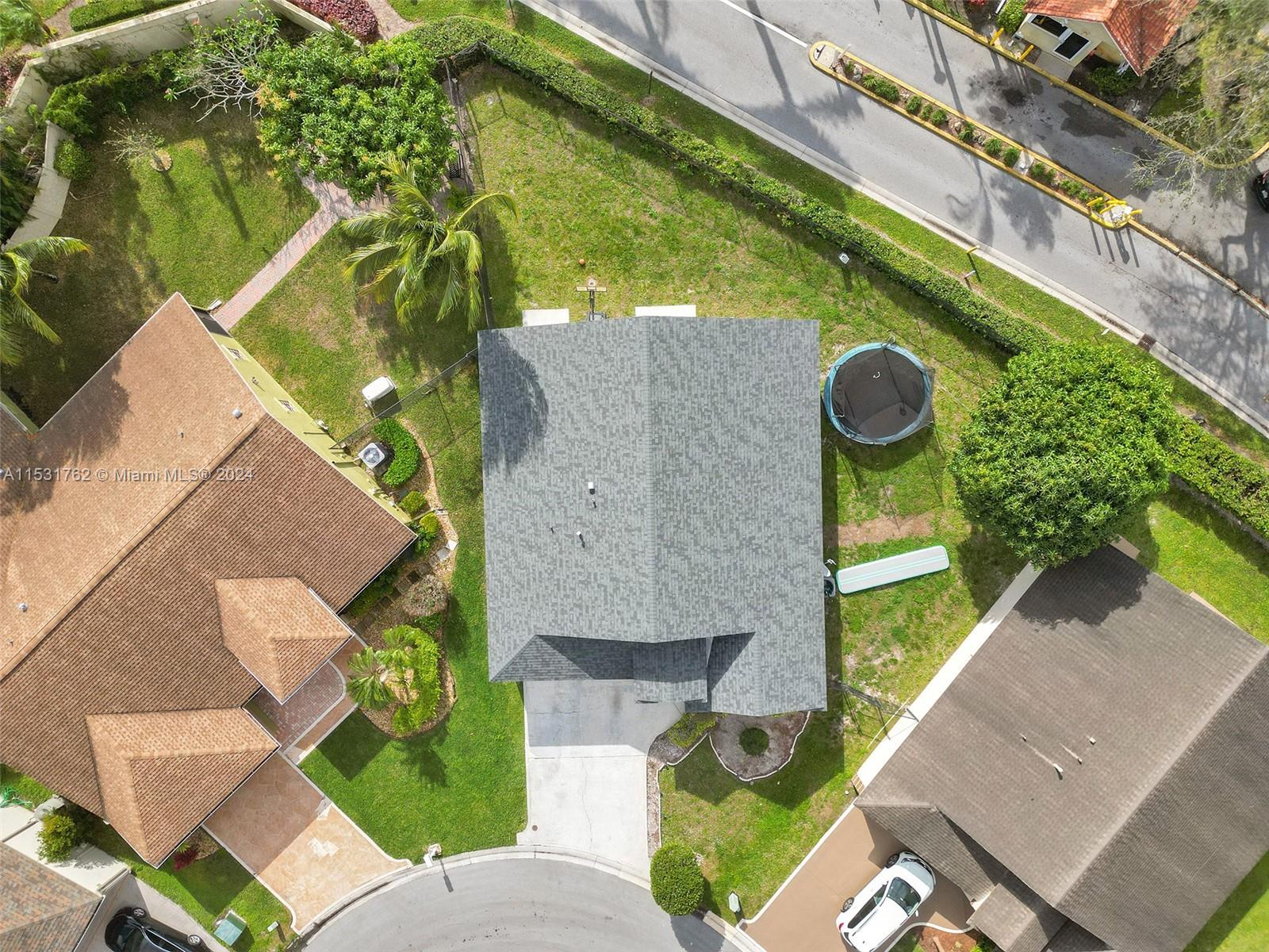 Greenacres Greenacres, FL 33413 - Photo 52 of 61 an aerial view of a house with a yard