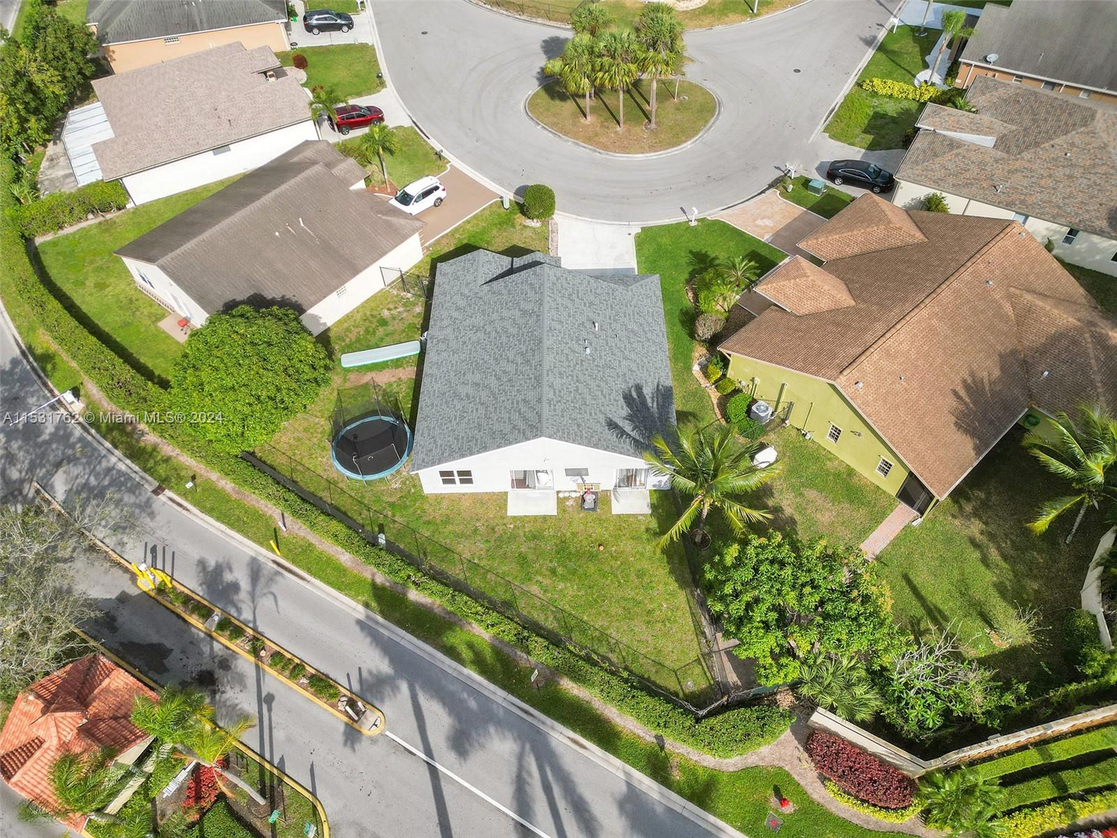 Greenacres Greenacres, FL 33413 - Photo 57 of 61 an aerial view of a residential houses with yard