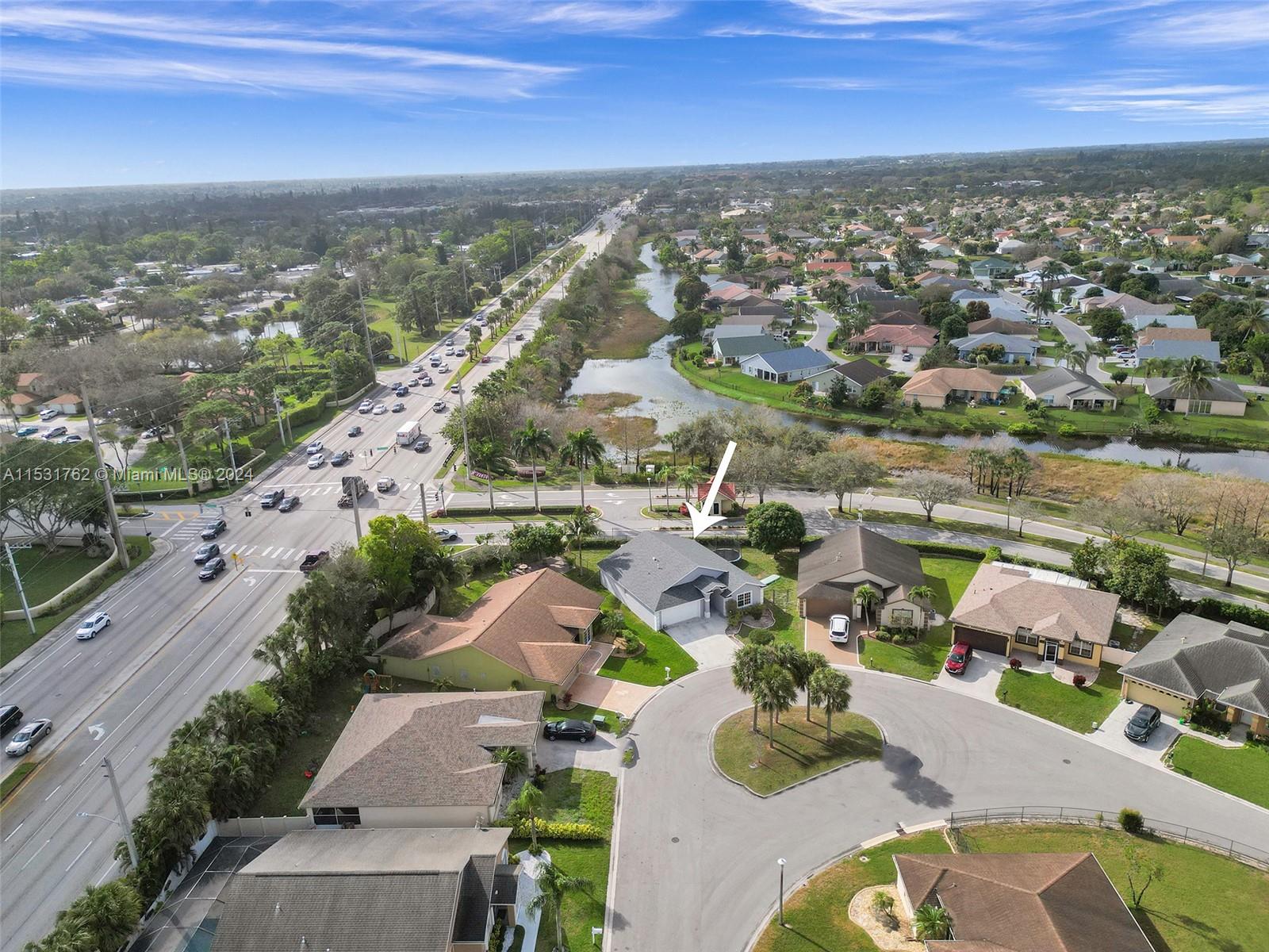 Greenacres Greenacres, FL 33413 - Photo 59 of 61 an aerial view of a city with lots of residential buildings