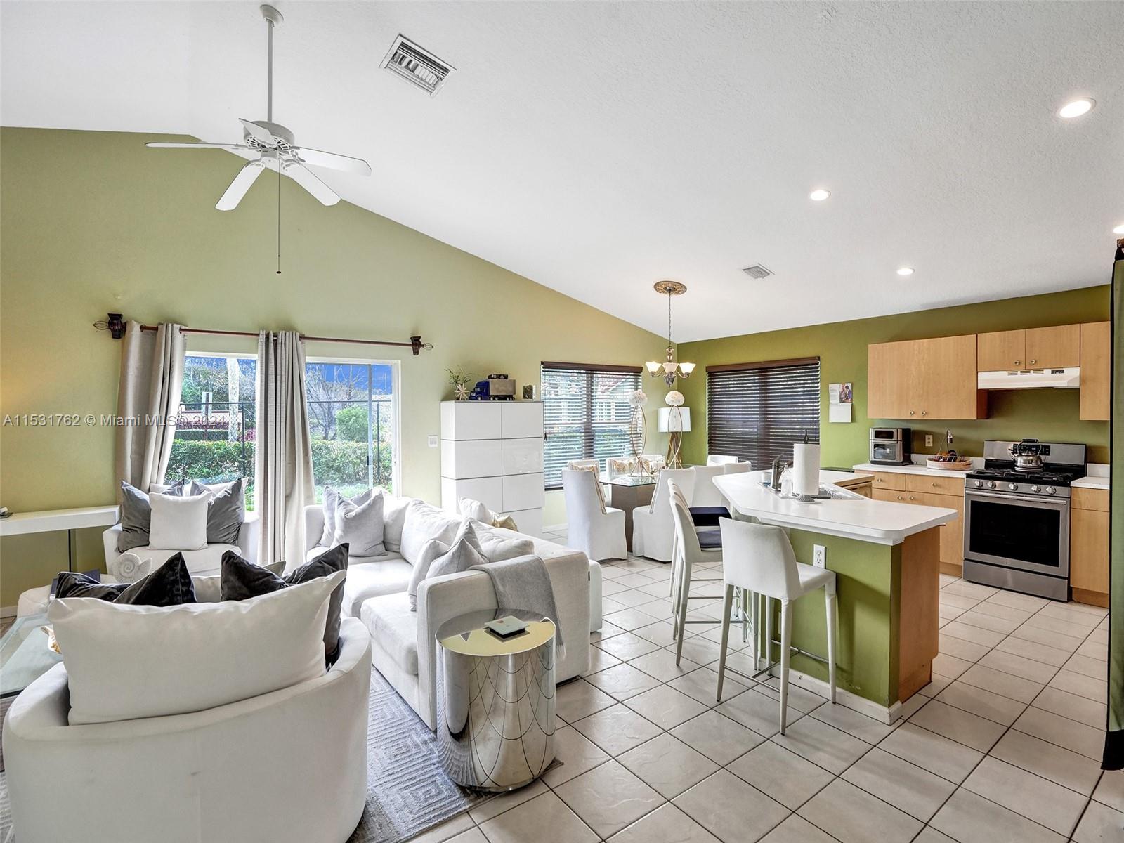 Greenacres Greenacres, FL 33413 - Photo 6 of 61 a living room with furniture and a large window