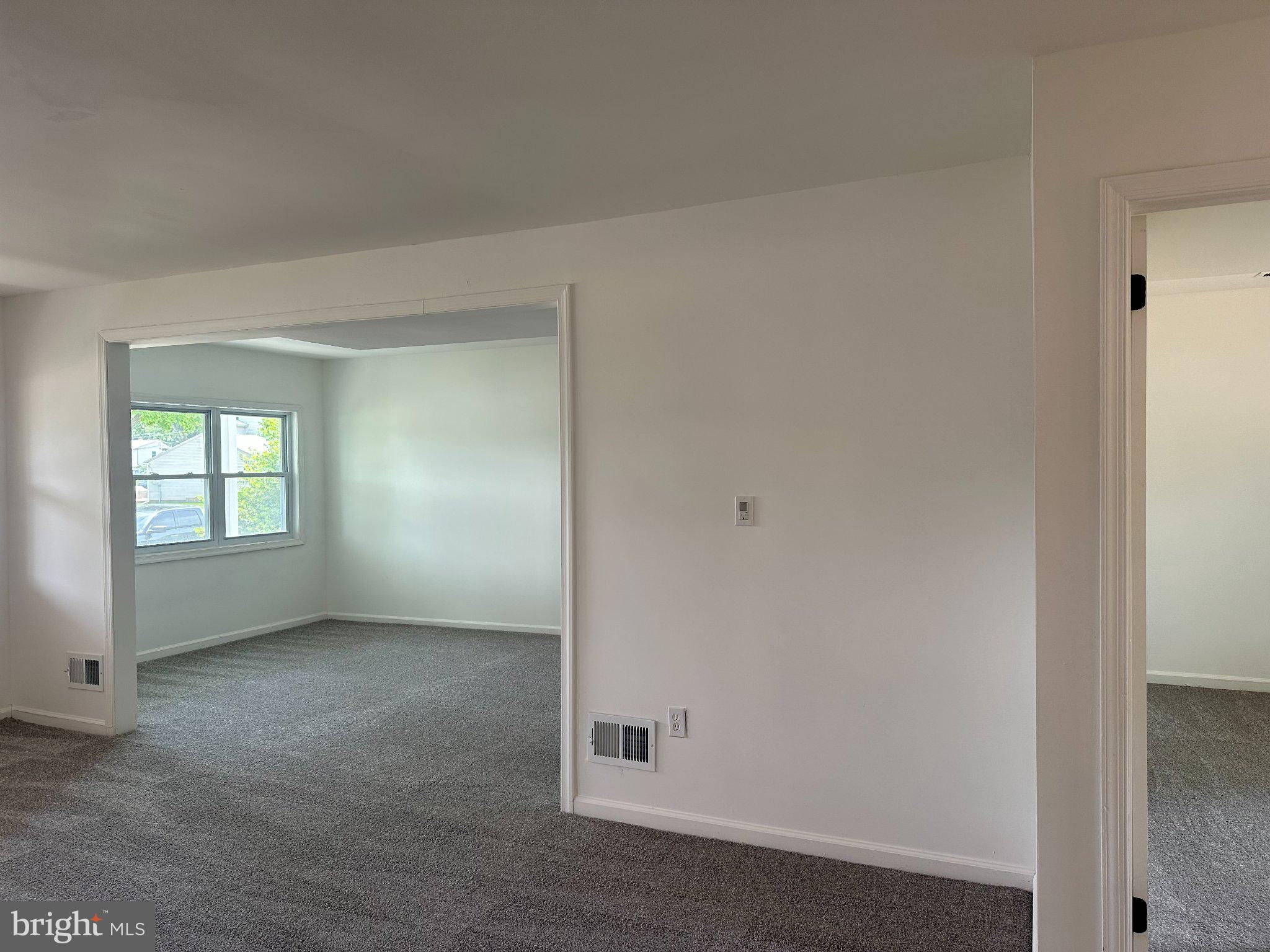 6 Travertine Way Newark, DE 19702 - Photo 7 of 22 an empty room with windows