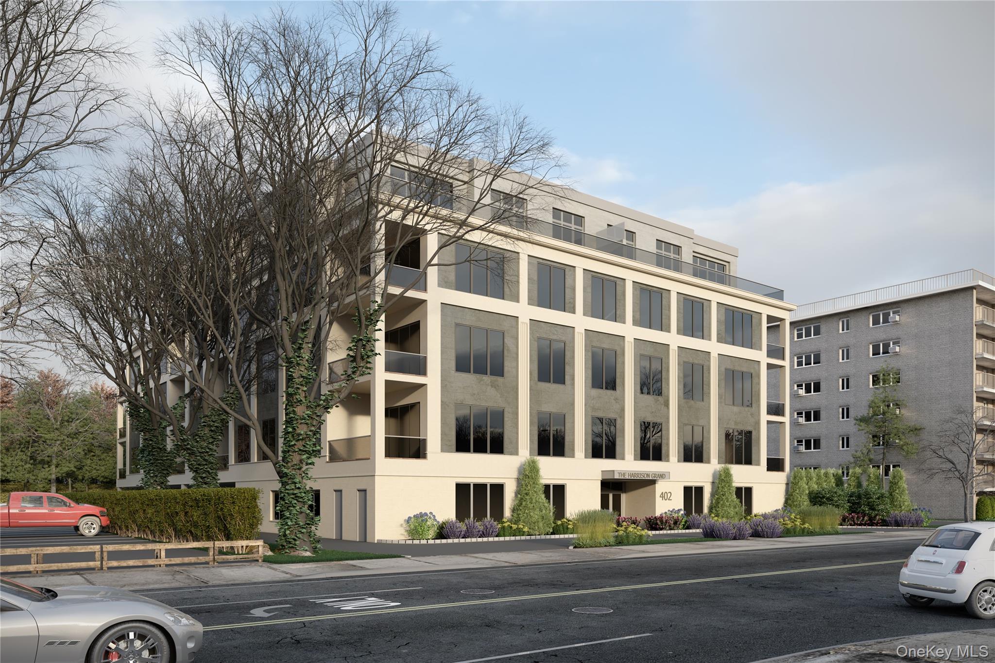 402 Halstead Avenue, Unit 102 Harrison, NY 10528 - Photo 1 of 1 a view of a building and a street