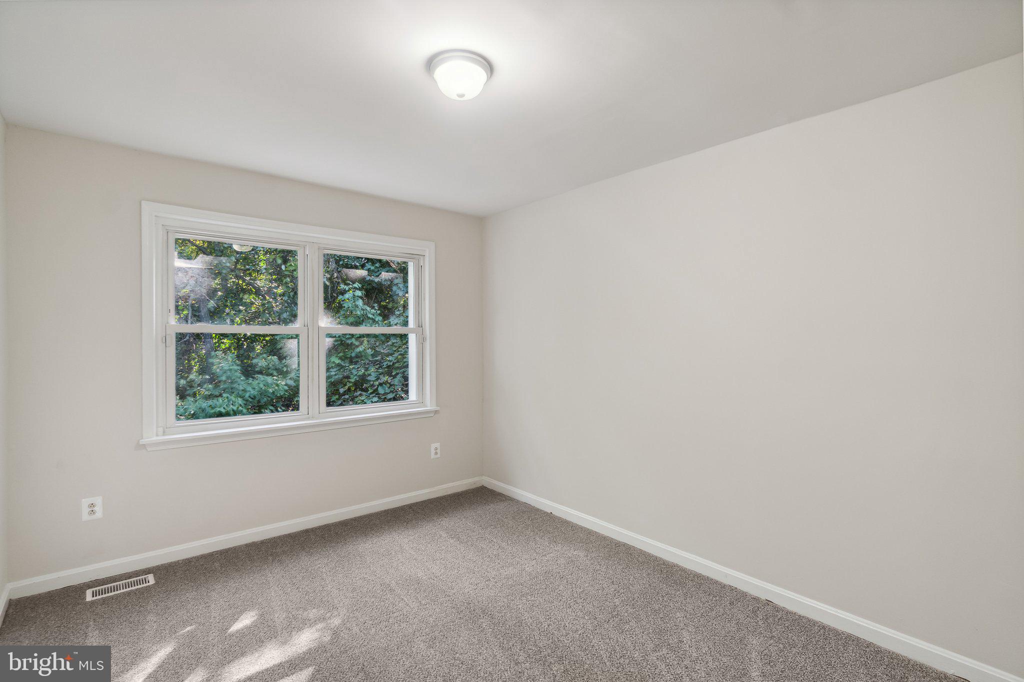 5047 Sheriff Road Northeast Washington, DC 20019 - Photo 16 of 20 Second bedroom