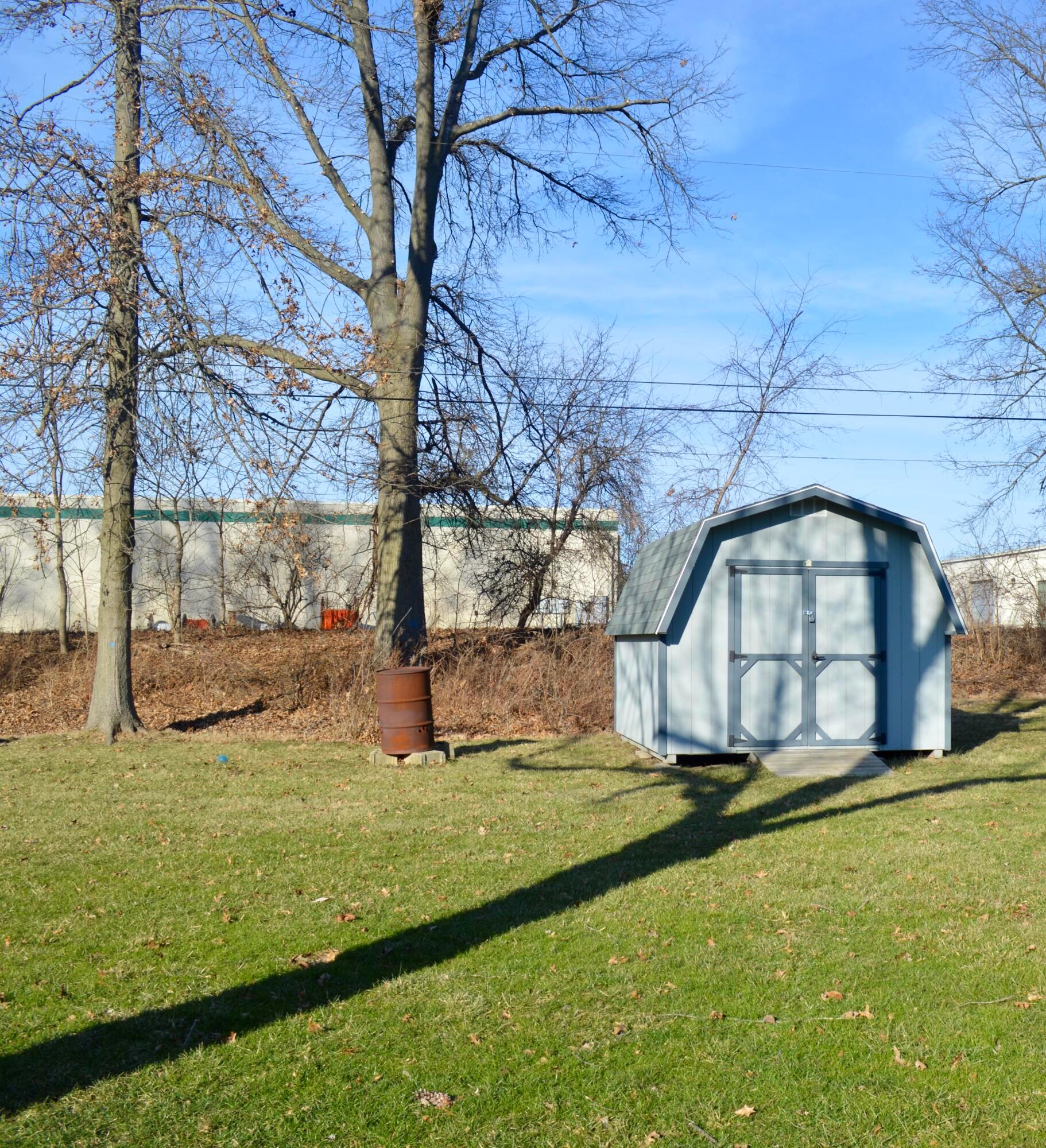 85 Barry Road Southwest Pataskala, OH 43068 - Photo 24 of 30 Large storage shed is tucked into the corner of the backyard...