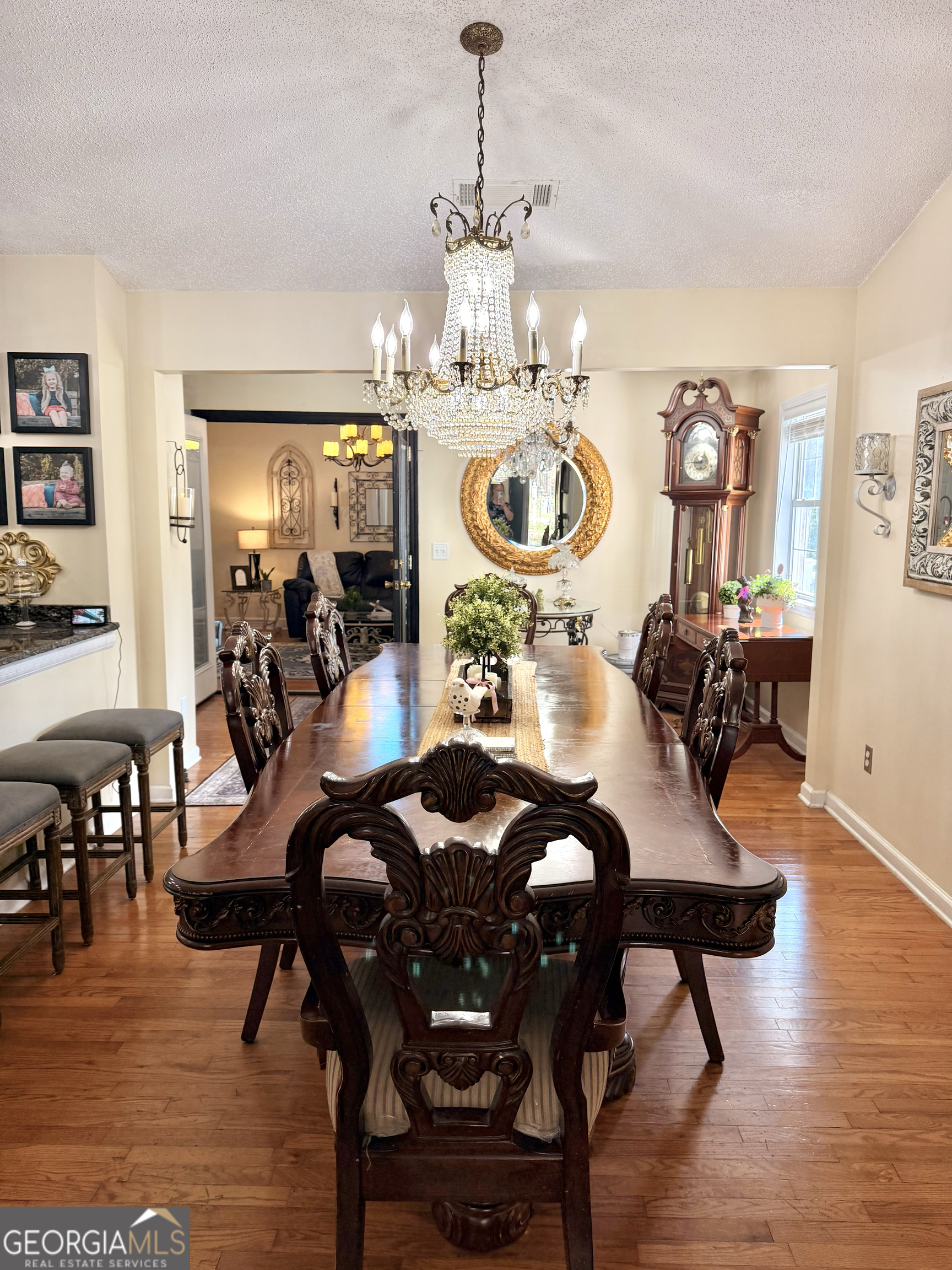 240 Ray Street Tallapoosa, GA 30176 - Photo 15 of 90 a view of a dining room with furniture and chandelier