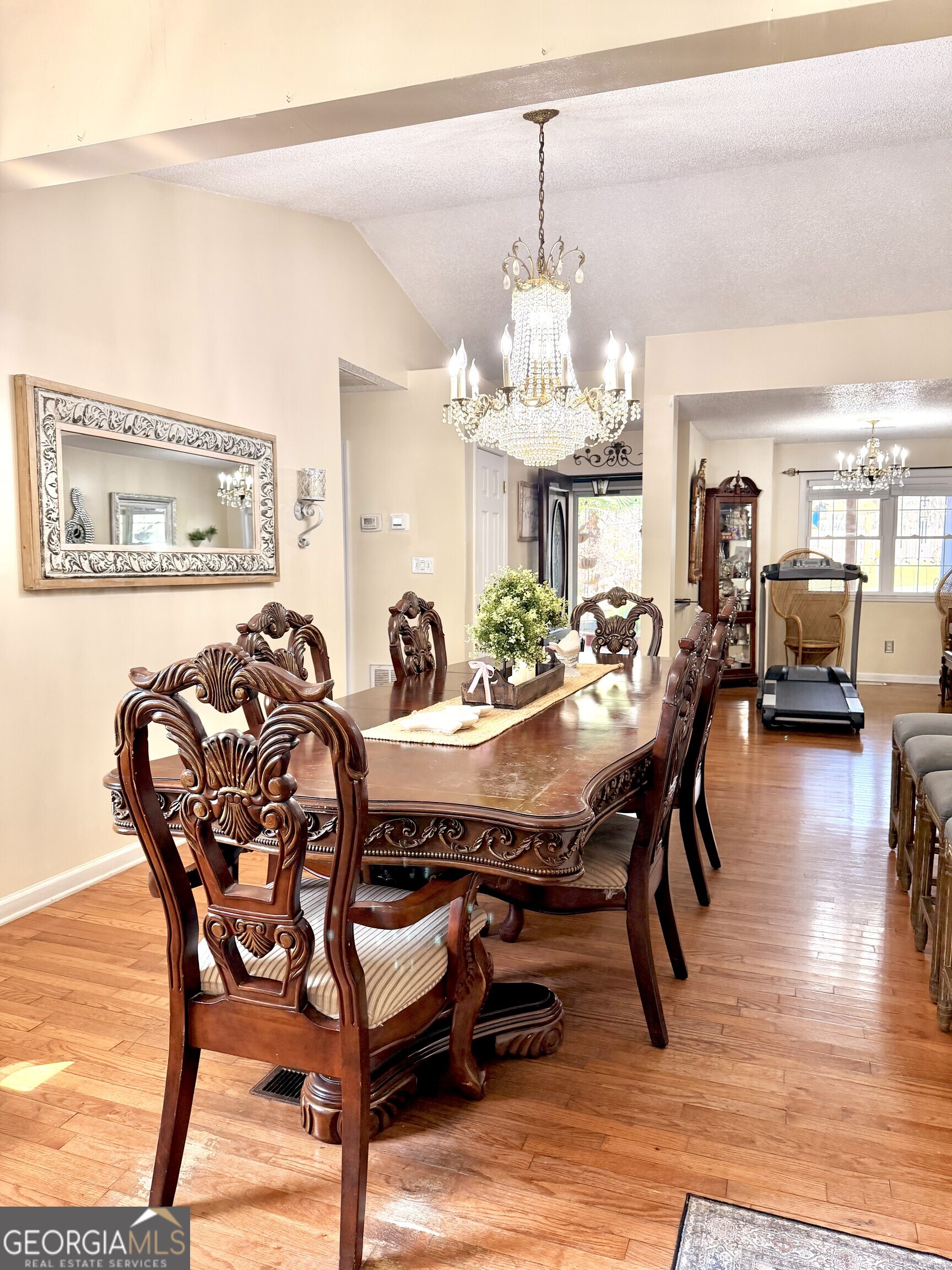 240 Ray Street Tallapoosa, GA 30176 - Photo 19 of 90 a view of a dining room with furniture wooden floor and chandelier