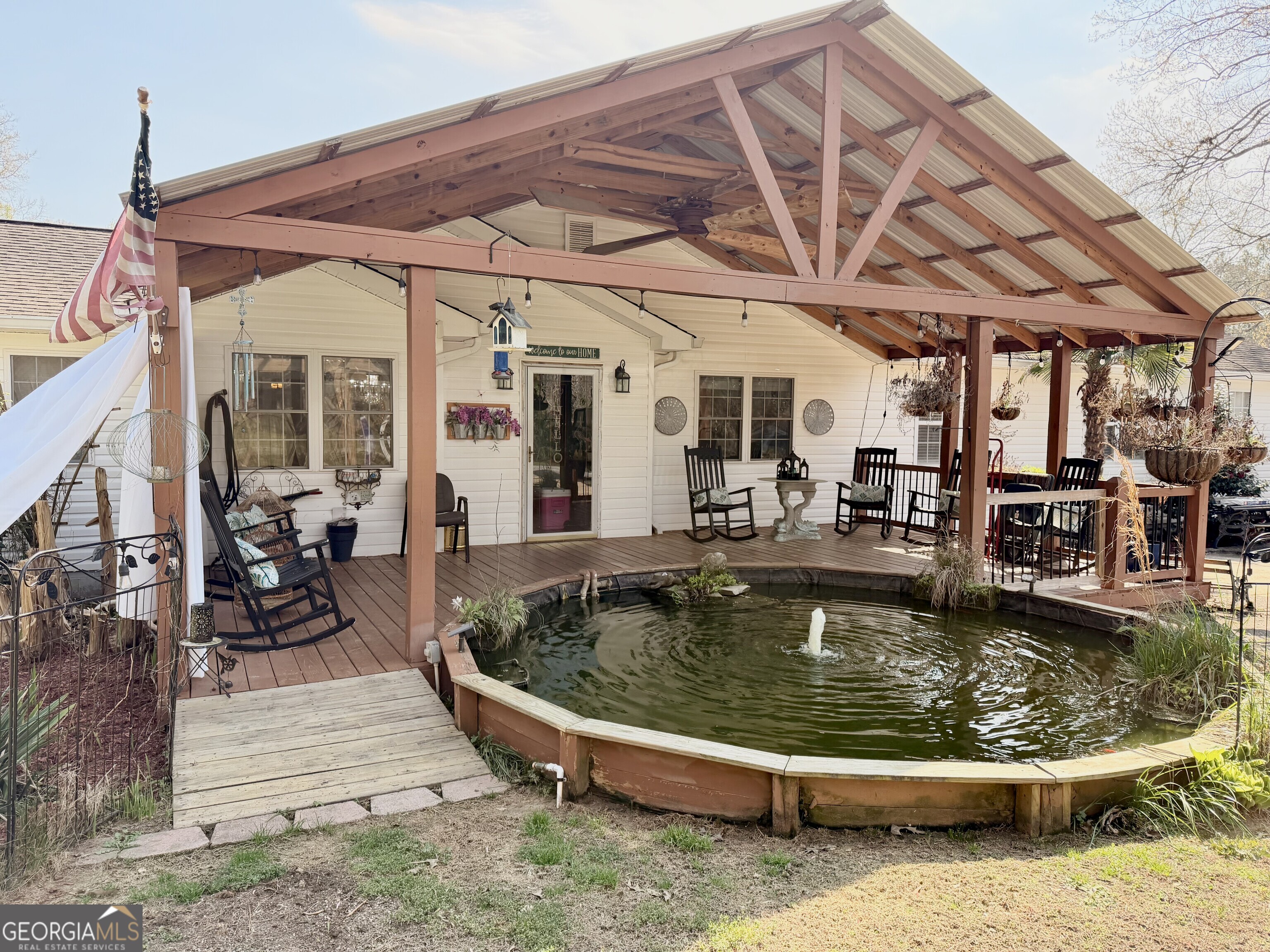 240 Ray Street Tallapoosa, GA 30176 - Photo 2 of 90 a view of a swimming pool with sitting area