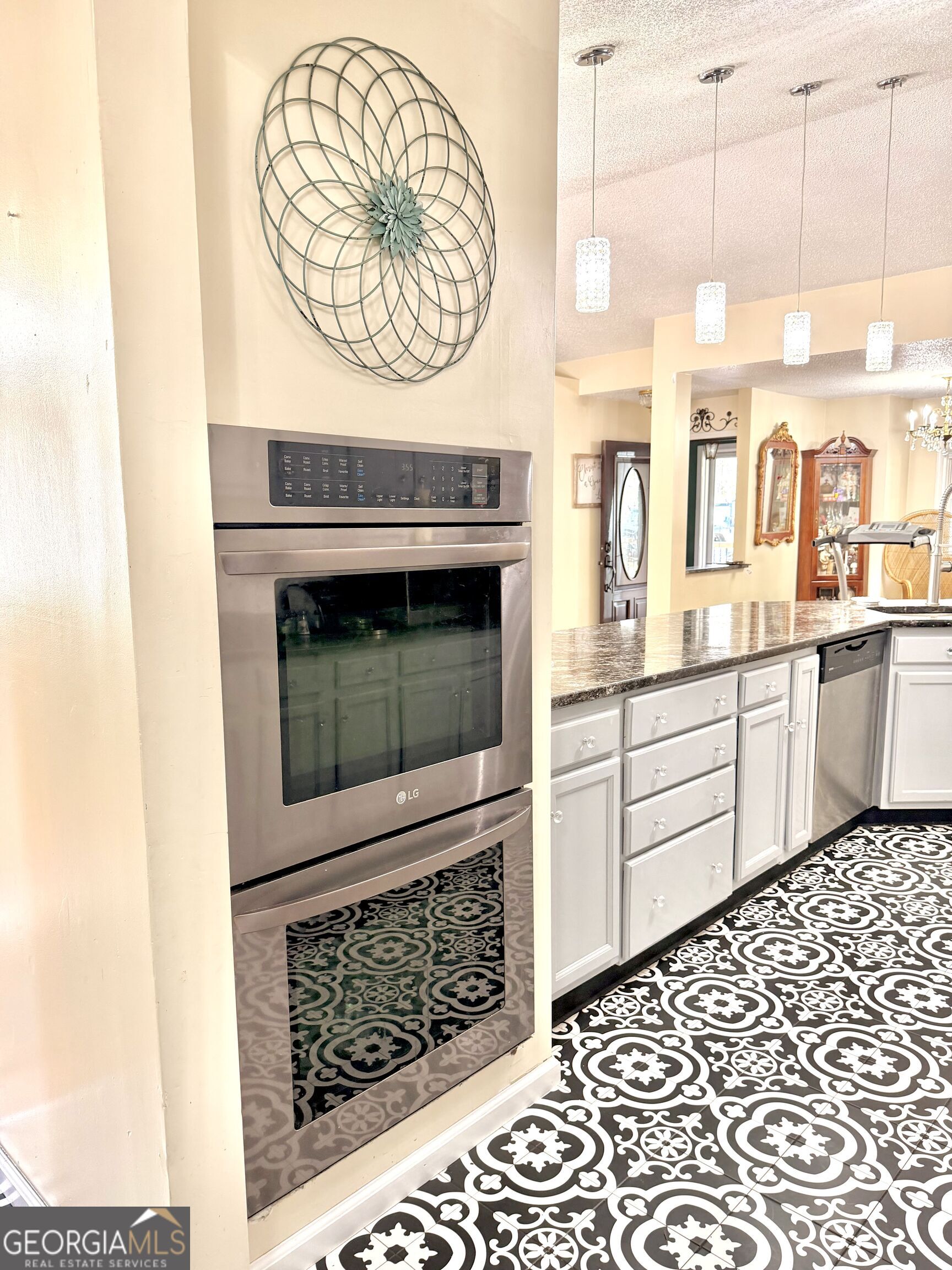 240 Ray Street Tallapoosa, GA 30176 - Photo 35 of 90 a kitchen with a stove and a white cabinet