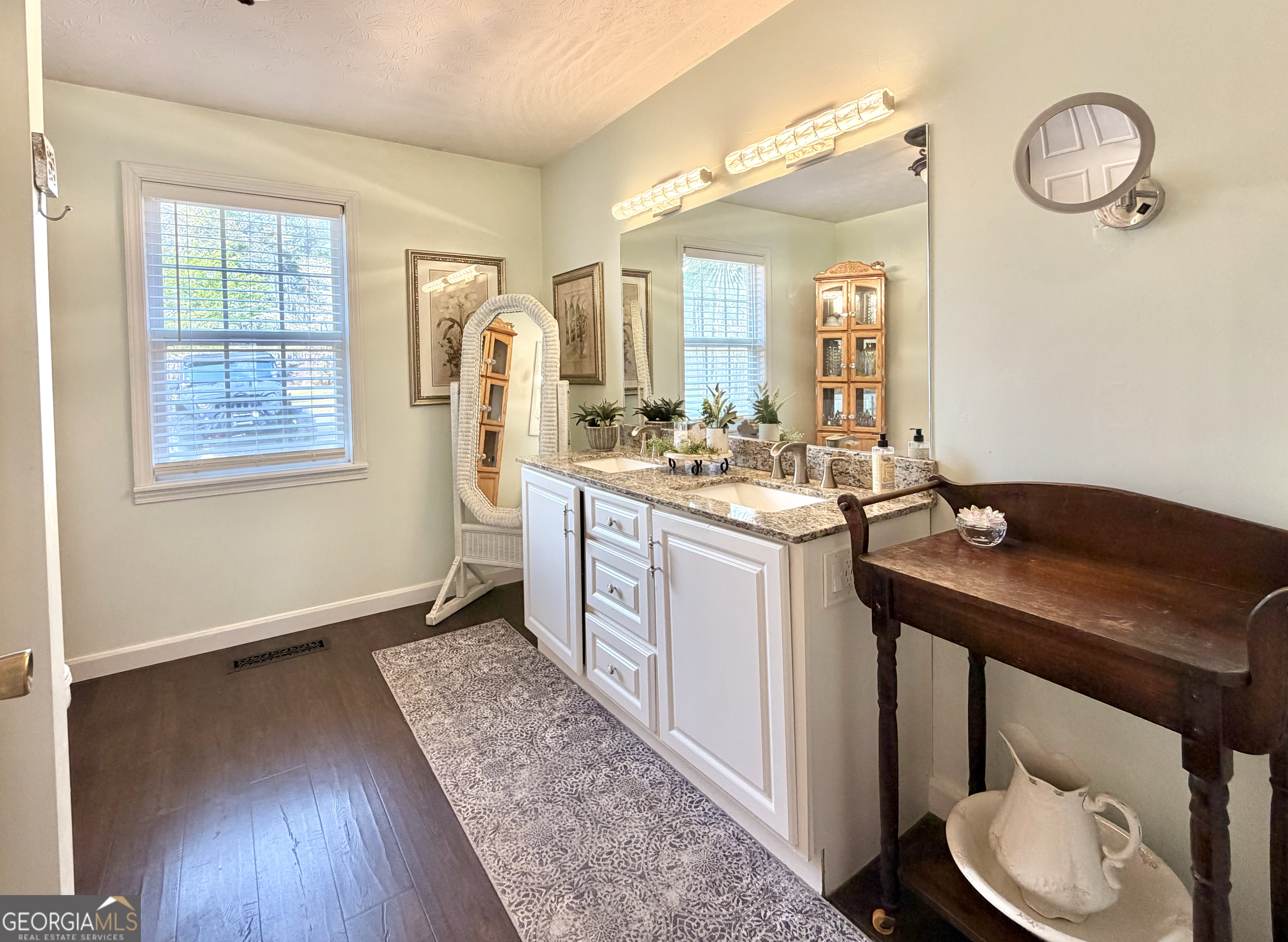 240 Ray Street Tallapoosa, GA 30176 - Photo 44 of 90 a bathroom with a sink a toilet and mirror