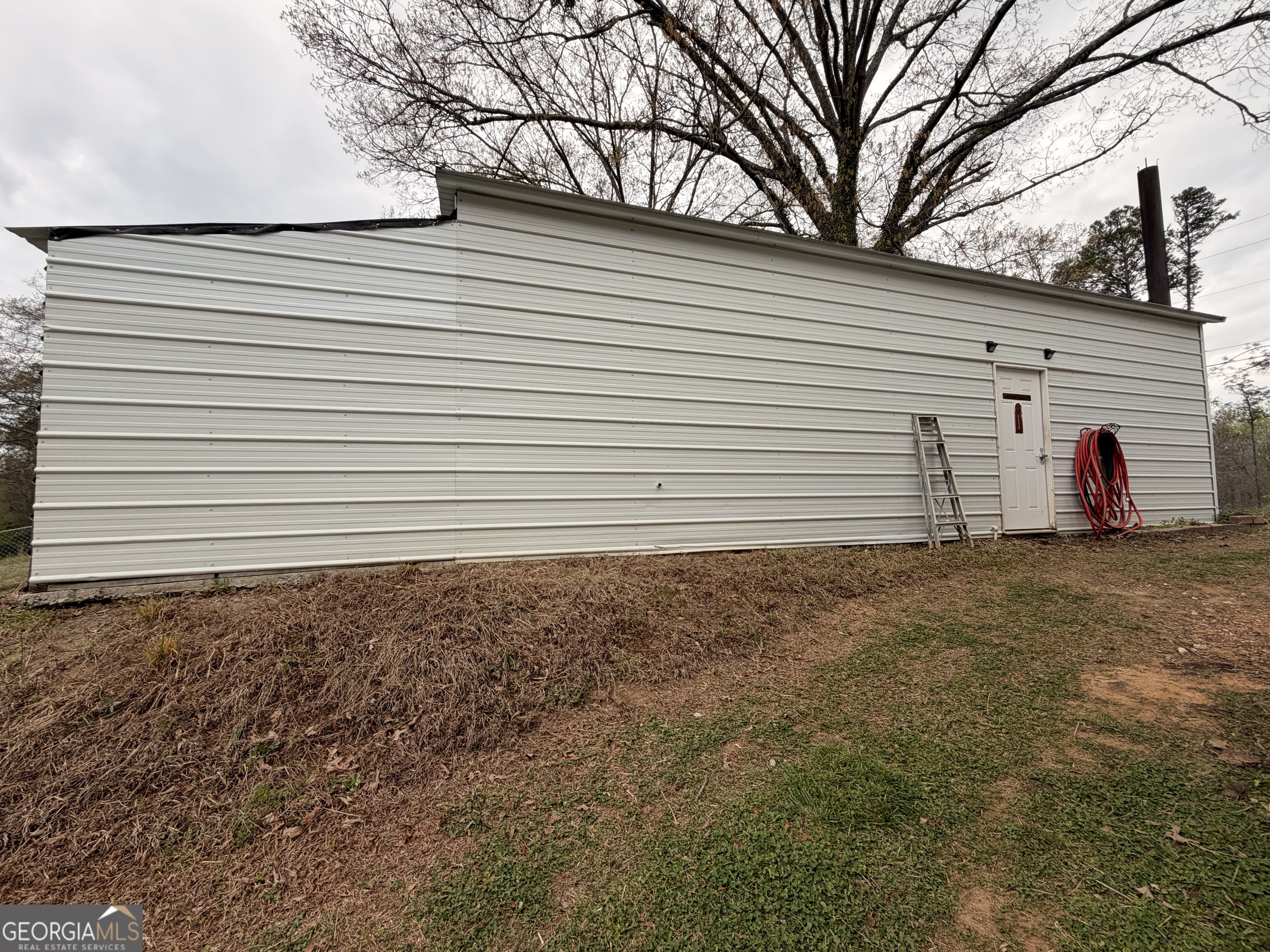 240 Ray Street Tallapoosa, GA 30176 - Photo 65 of 90 a view of a backyard