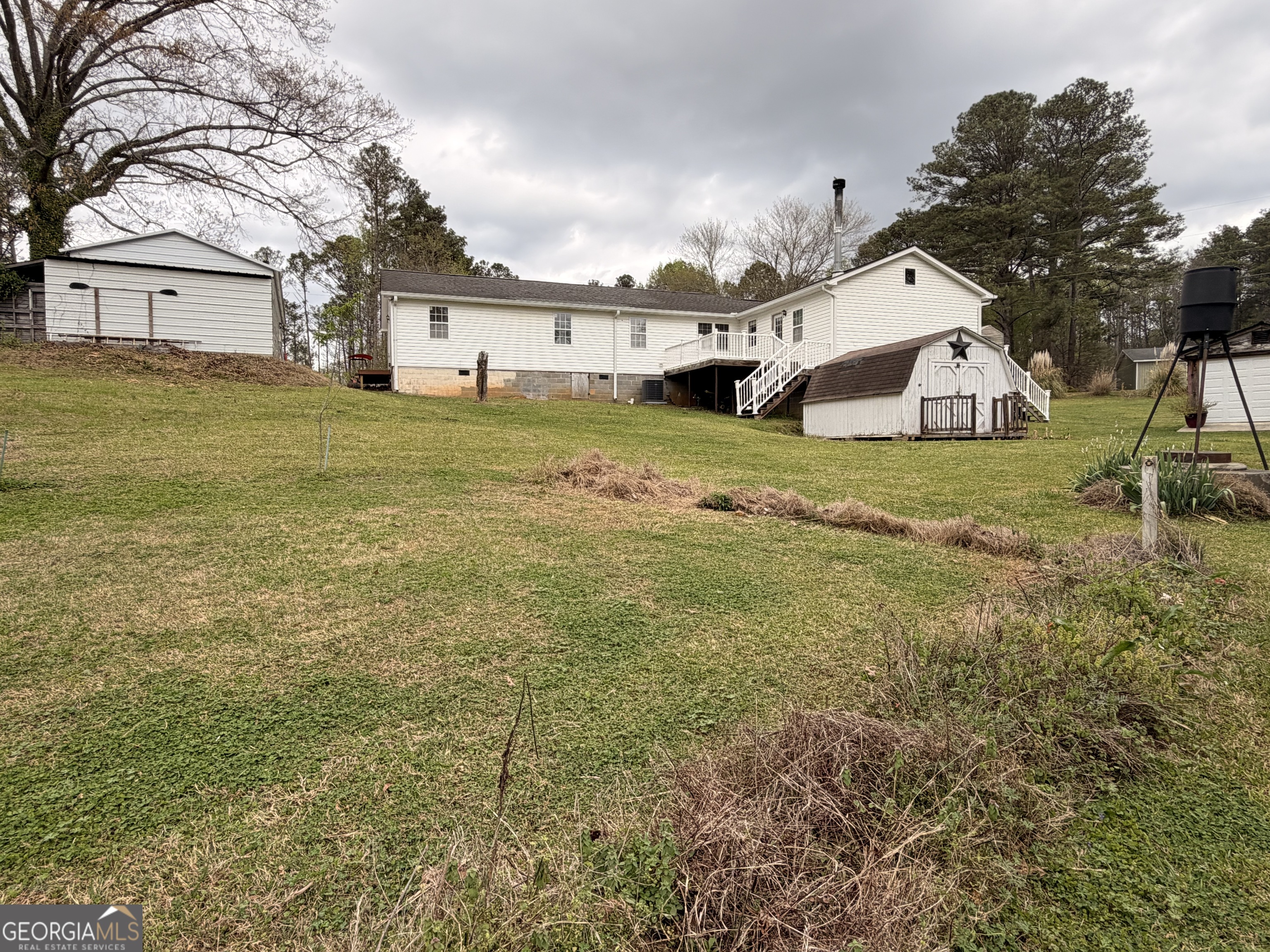 240 Ray Street Tallapoosa, GA 30176 - Photo 68 of 90 a front view of house with yard and trees
