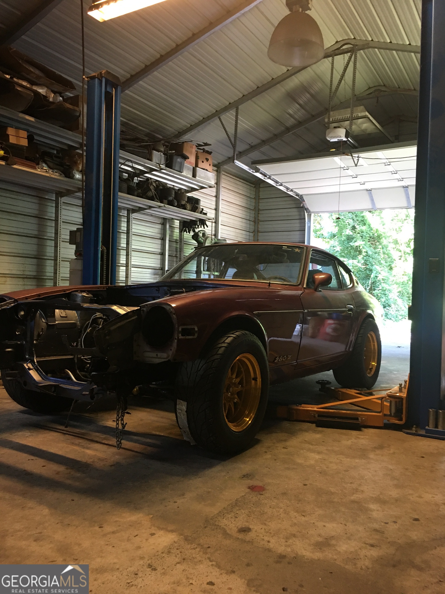 240 Ray Street Tallapoosa, GA 30176 - Photo 74 of 90 a car parked in garage