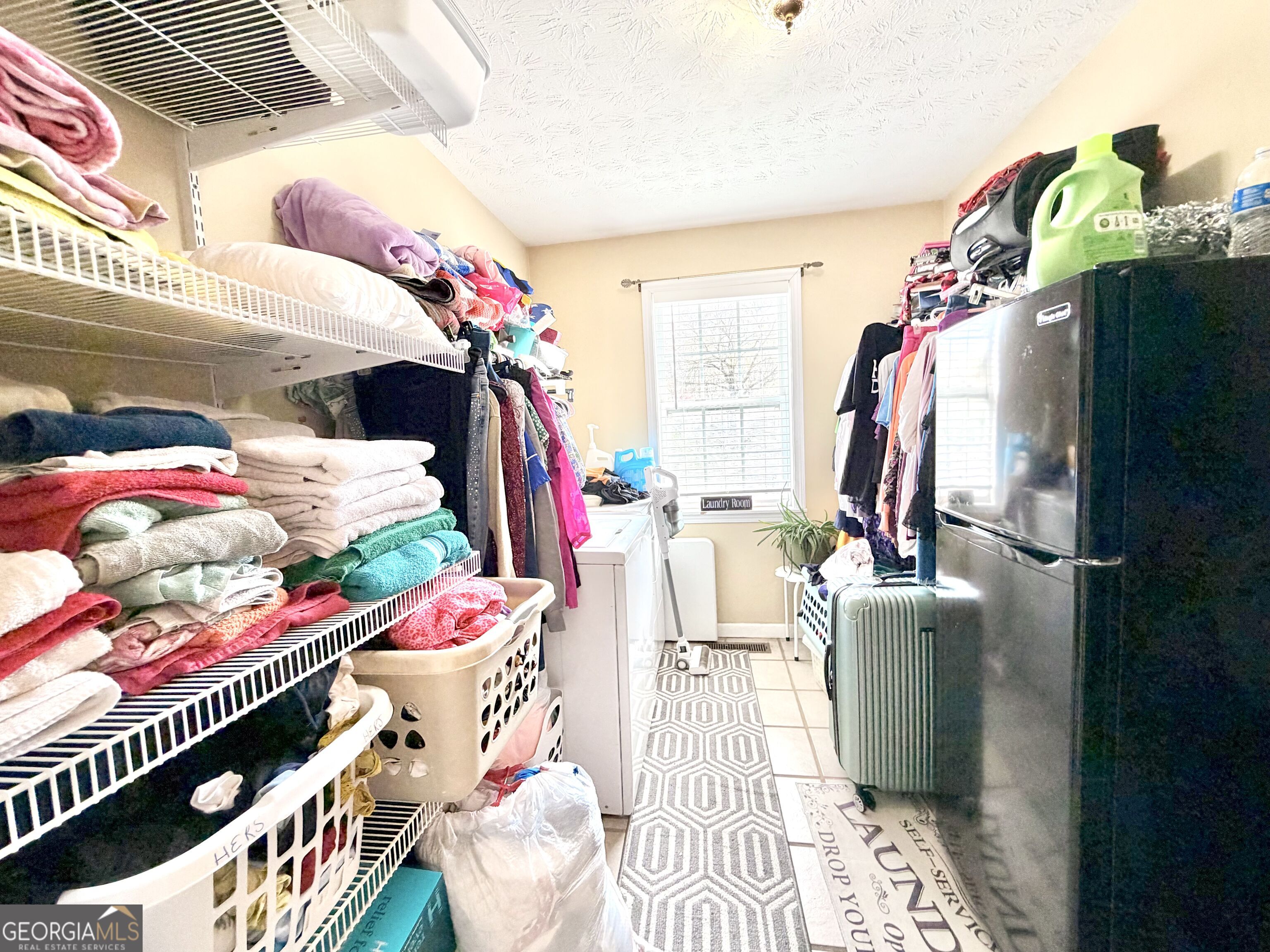 240 Ray Street Tallapoosa, GA 30176 - Photo 78 of 90 a bed room with a bed and a couch