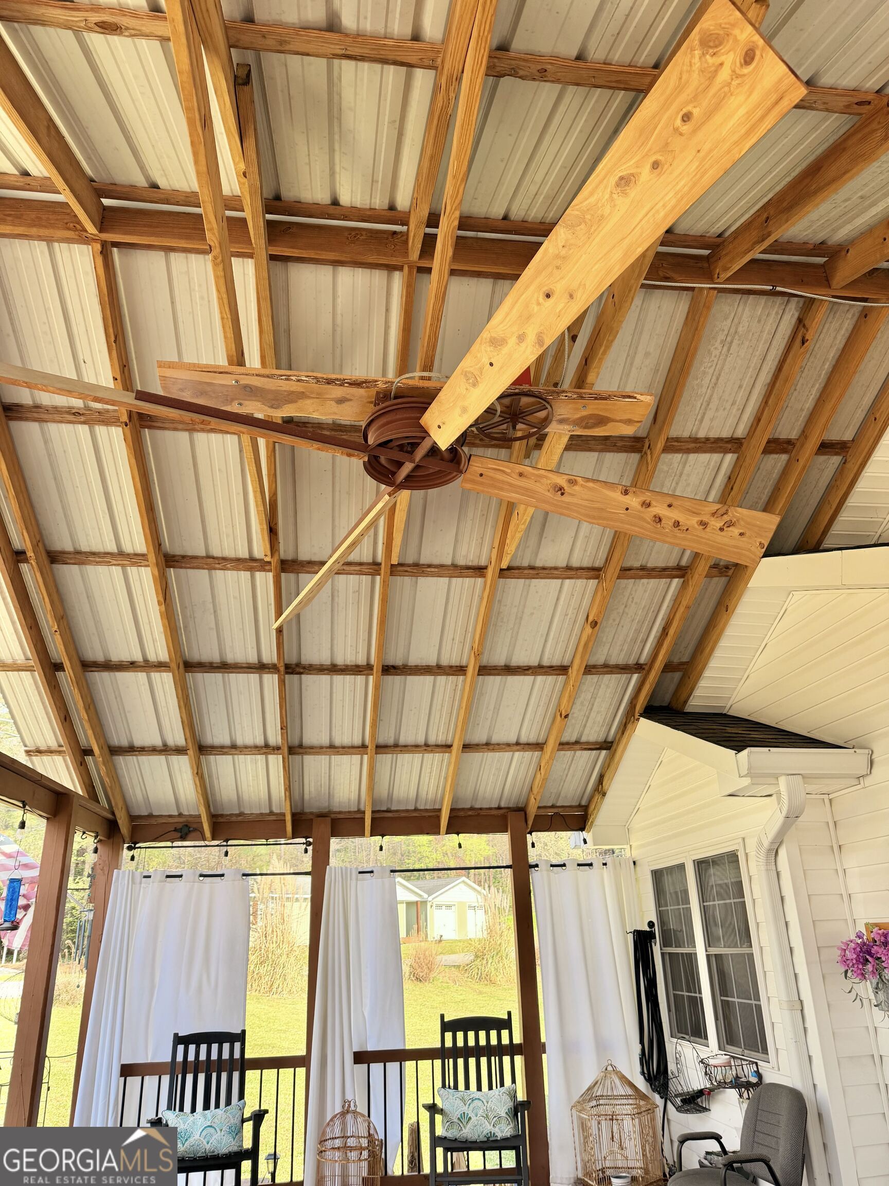 240 Ray Street Tallapoosa, GA 30176 - Photo 8 of 90 a view of a garage with wooden floor