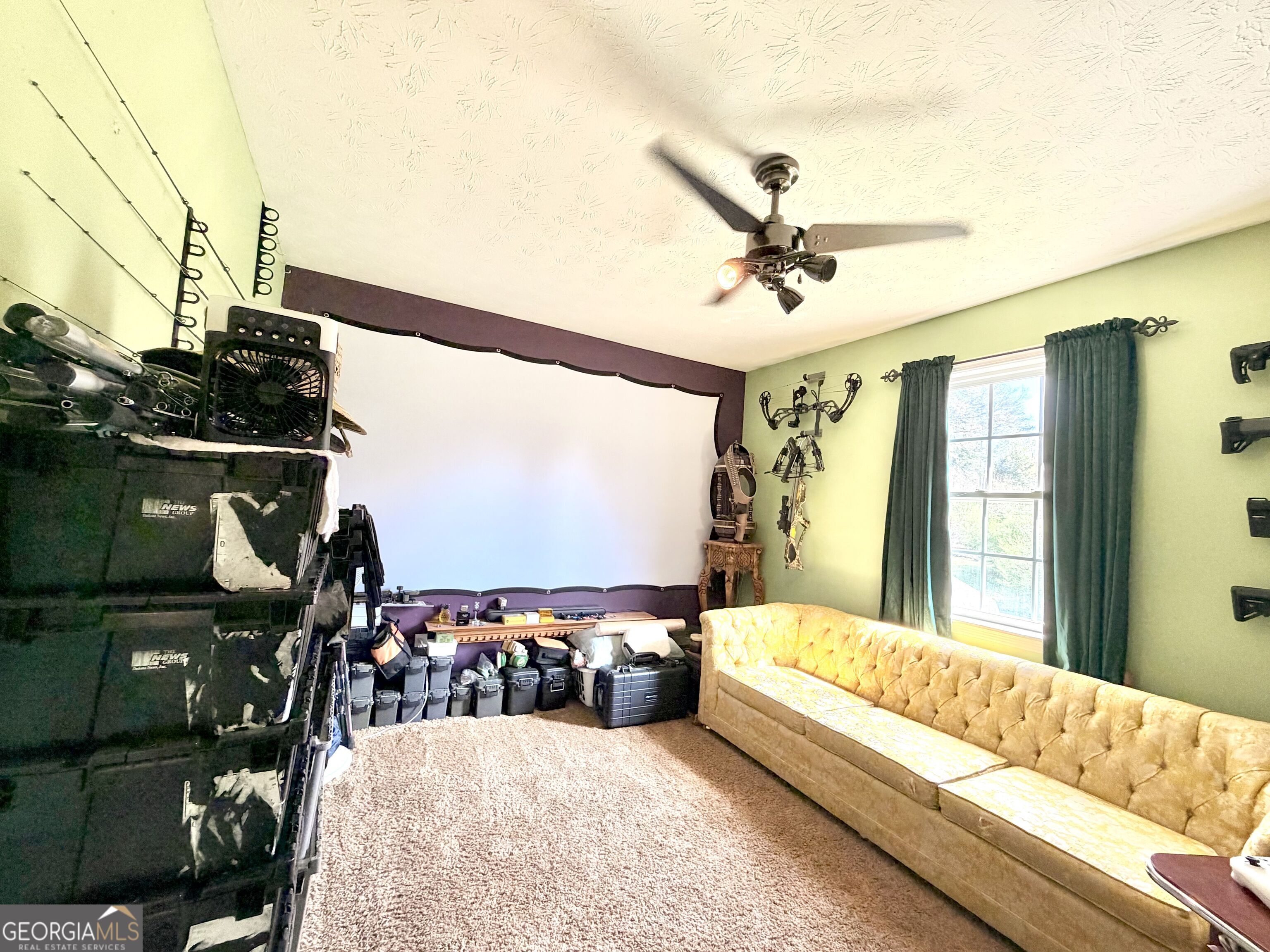 240 Ray Street Tallapoosa, GA 30176 - Photo 81 of 90 a bedroom with a bed couch and a window