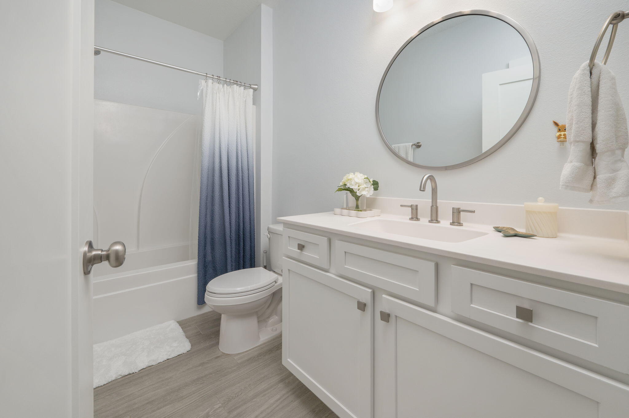 8 Maple Avenue Shalimar, FL 32579 - Photo 38 of 71 a bathroom with a toilet a sink and a mirror
