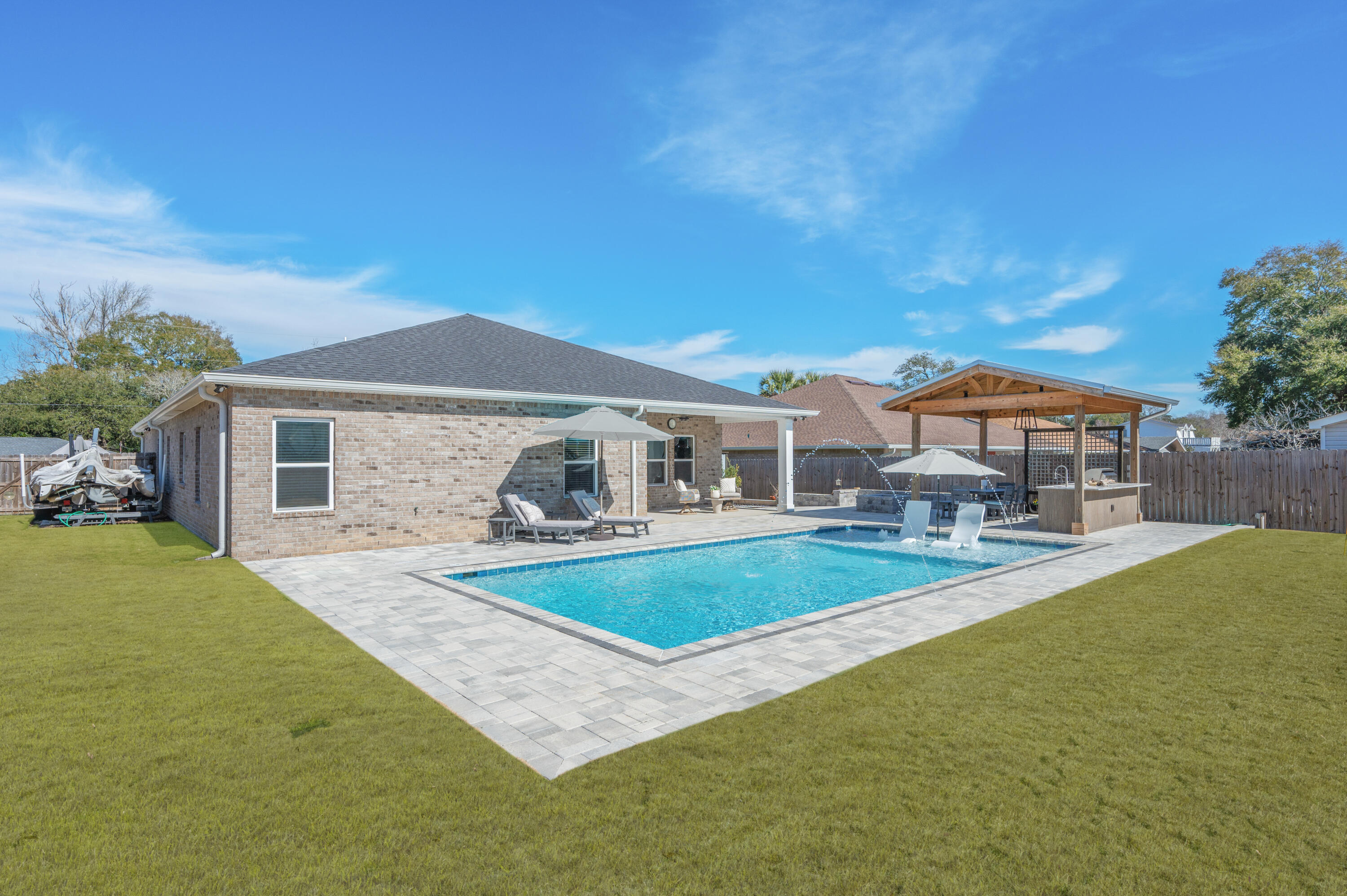 8 Maple Avenue Shalimar, FL 32579 - Photo 4 of 71 a front view of house with yard and outdoor seating