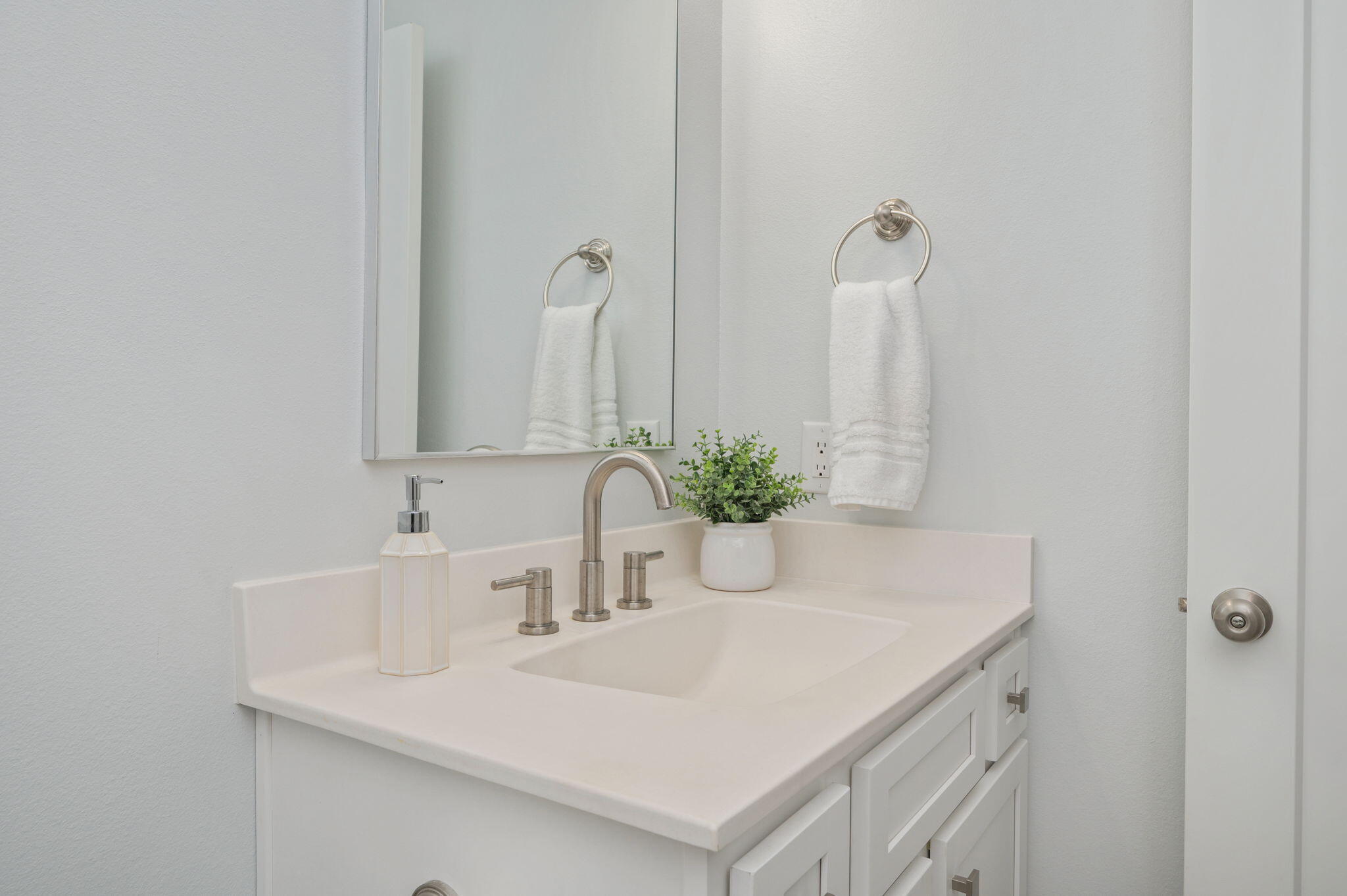 8 Maple Avenue Shalimar, FL 32579 - Photo 49 of 71 a bathroom with a sink and a mirror