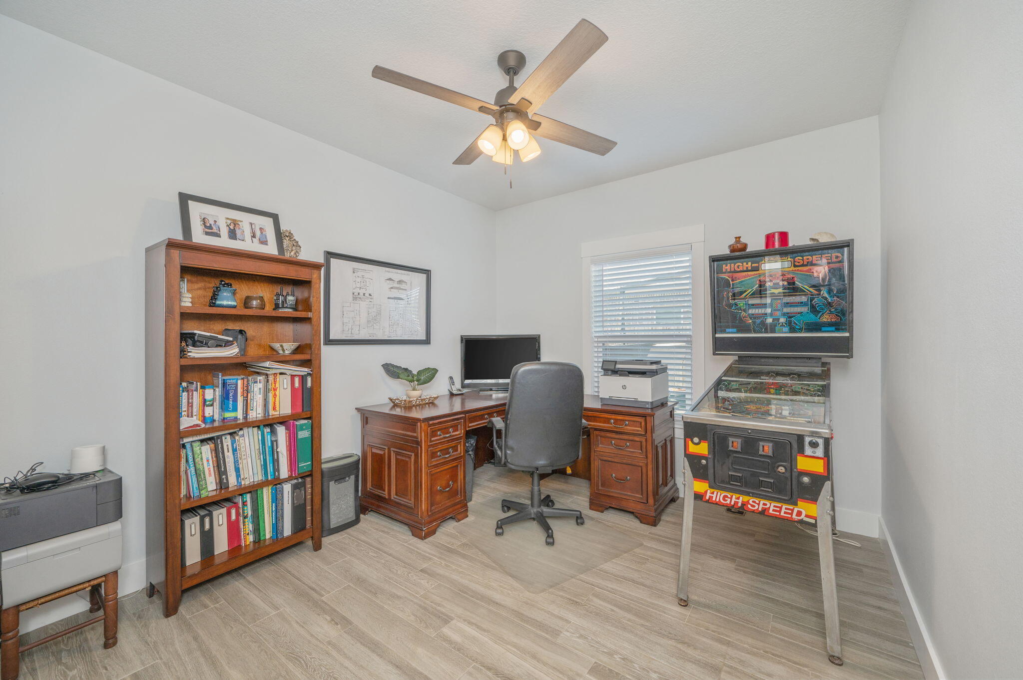 8 Maple Avenue Shalimar, FL 32579 - Photo 50 of 71 a workspace with a bookshelf