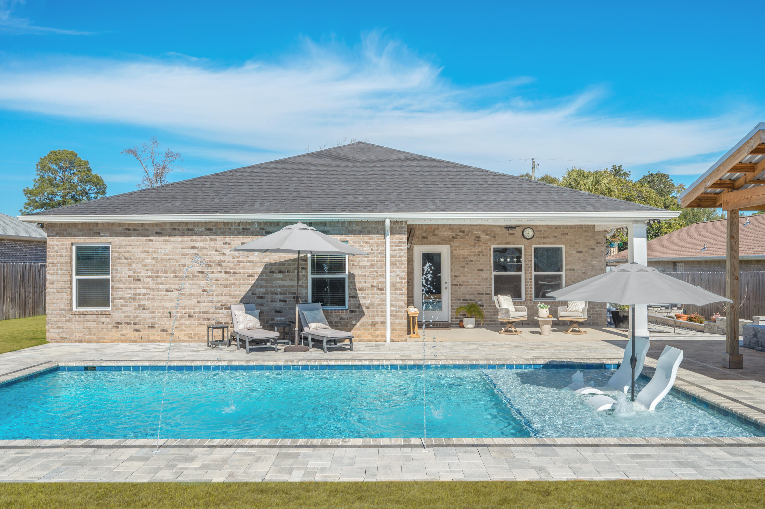 8 Maple Avenue Shalimar, FL 32579 - Photo 5 of 71 a front view of house with yard patio and fire pit