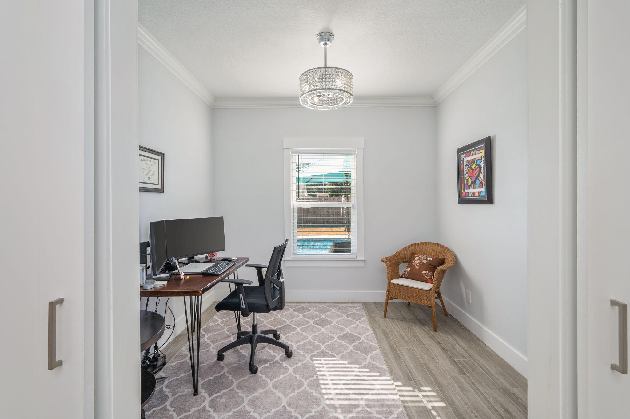 8 Maple Avenue Shalimar, FL 32579 - Photo 52 of 71 a workspace with wooden floor and a window