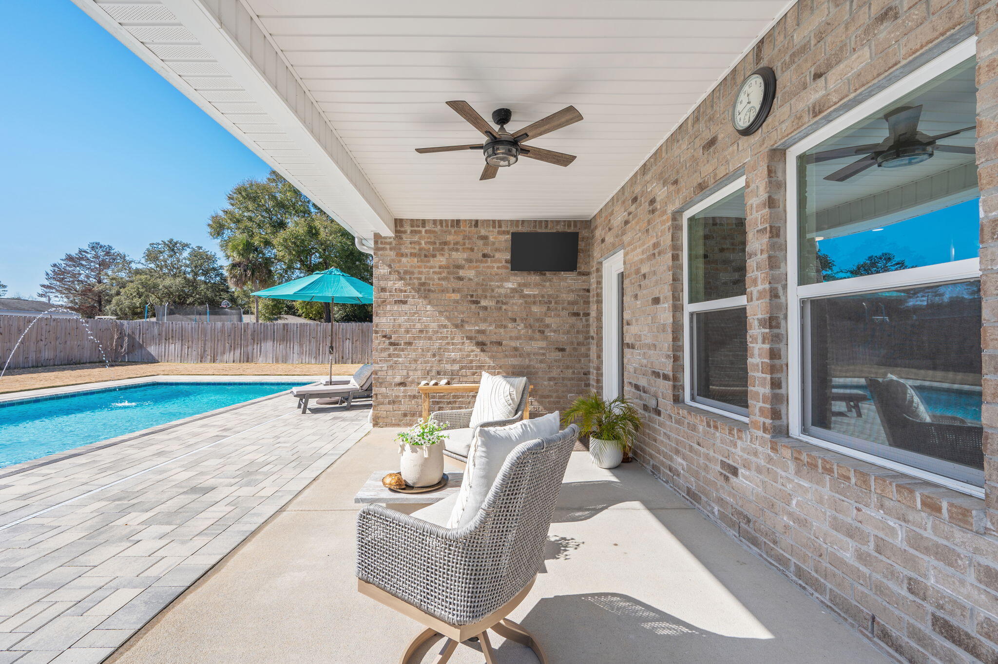 8 Maple Avenue Shalimar, FL 32579 - Photo 55 of 71 a view of a patio with a table and chairs