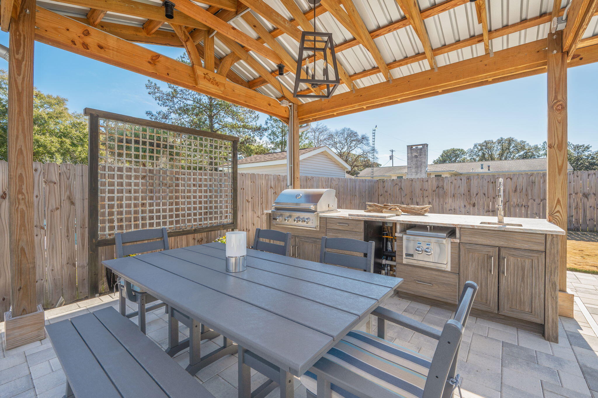 8 Maple Avenue Shalimar, FL 32579 - Photo 61 of 71 a view of a patio with table and chairs