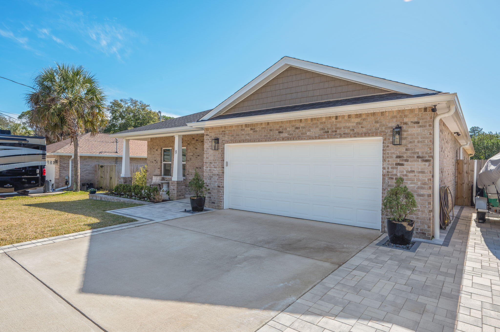 8 Maple Avenue Shalimar, FL 32579 - Photo 71 of 71 a front view of a house with a yard and garage
