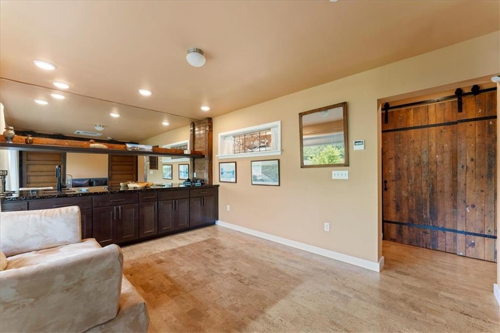 548 Penn Street Verona, PA 15147 - Photo 13 of 47 a living room with a couch and a view of kitchen