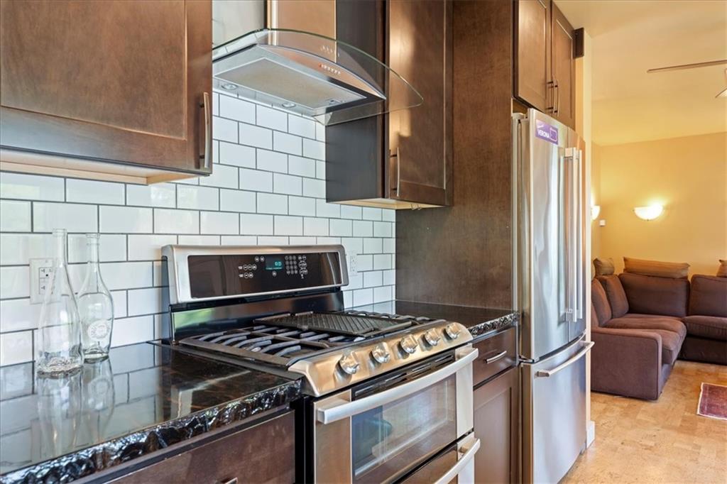 548 Penn Street Verona, PA 15147 - Photo 26 of 47 a stove top oven sitting inside of a kitchen