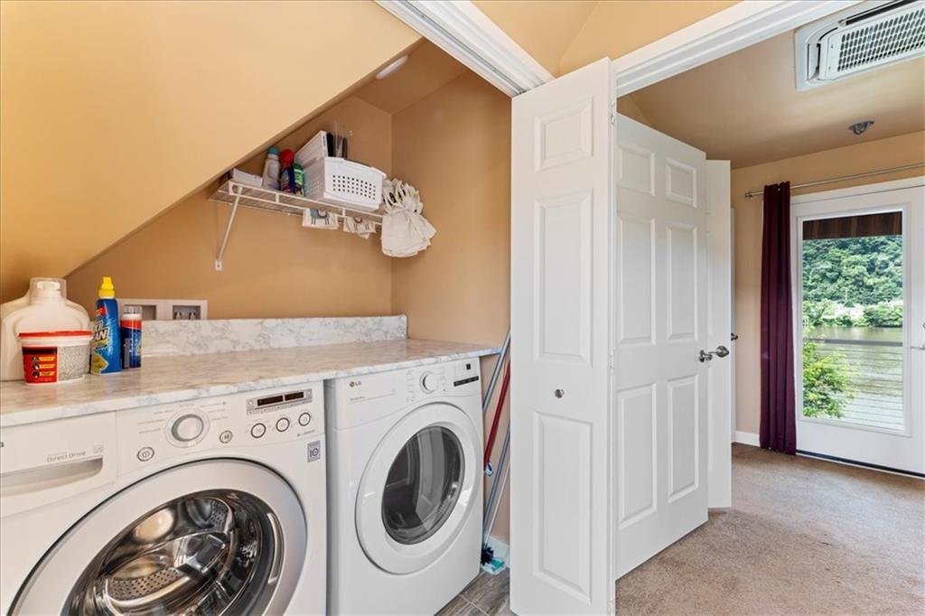 548 Penn Street Verona, PA 15147 - Photo 31 of 47 a view of livingroom with washer and dryer