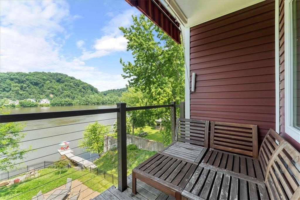 548 Penn Street Verona, PA 15147 - Photo 35 of 47 a view of a balcony with wooden floor
