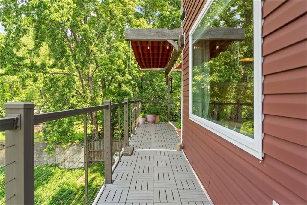 548 Penn Street Verona, PA 15147 - Photo 36 of 47 a view of balcony with wooden floor