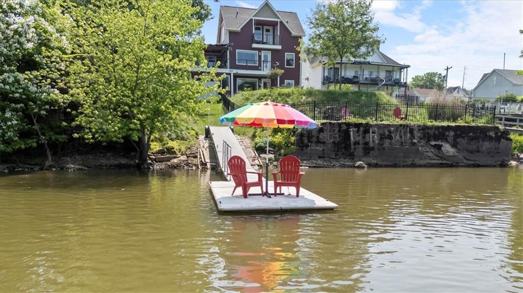 548 Penn Street Verona, PA 15147 - Photo 4 of 47 a view of a lake with a house