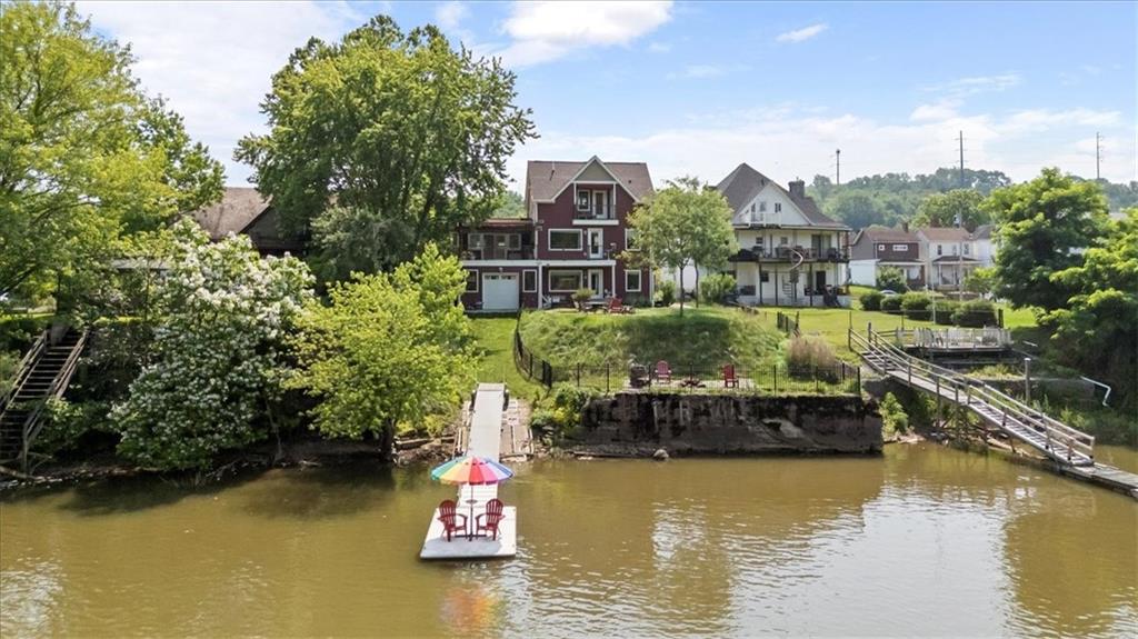 548 Penn Street Verona, PA 15147 - Photo 42 of 47 a view of a lake with a building in the background