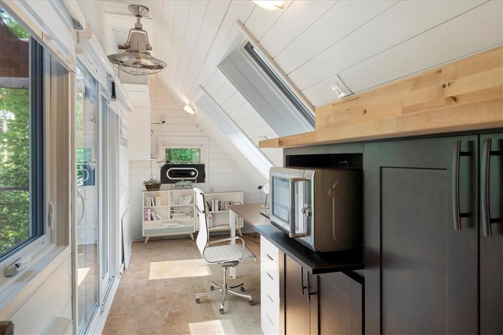 548 Penn Street Verona, PA 15147 - Photo 47 of 47 a hallway with dining table and chairs