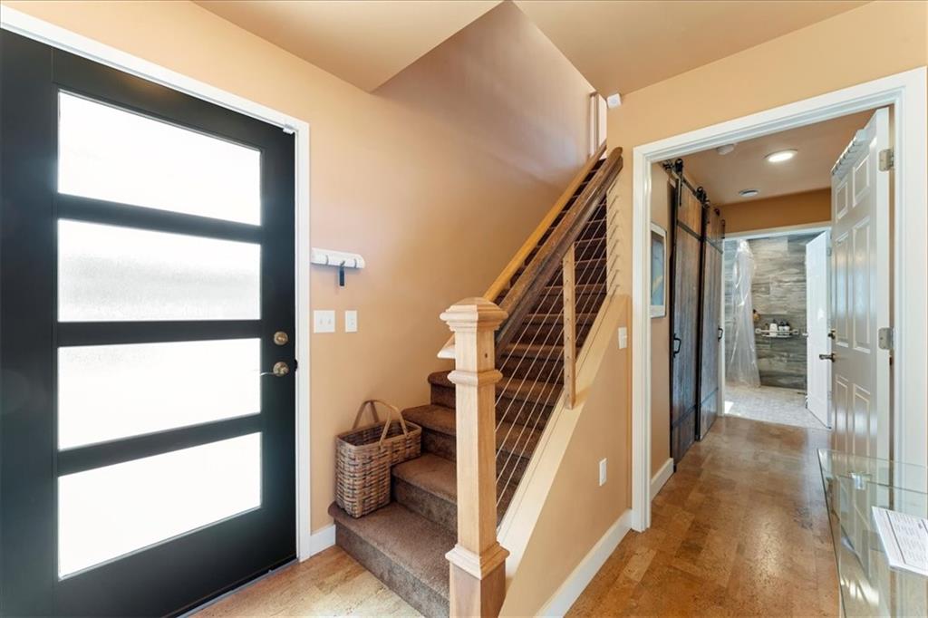 548 Penn Street Verona, PA 15147 - Photo 9 of 47 a view of entryway and hall with wooden floor